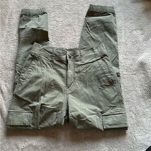 Green fitted cargo pants.